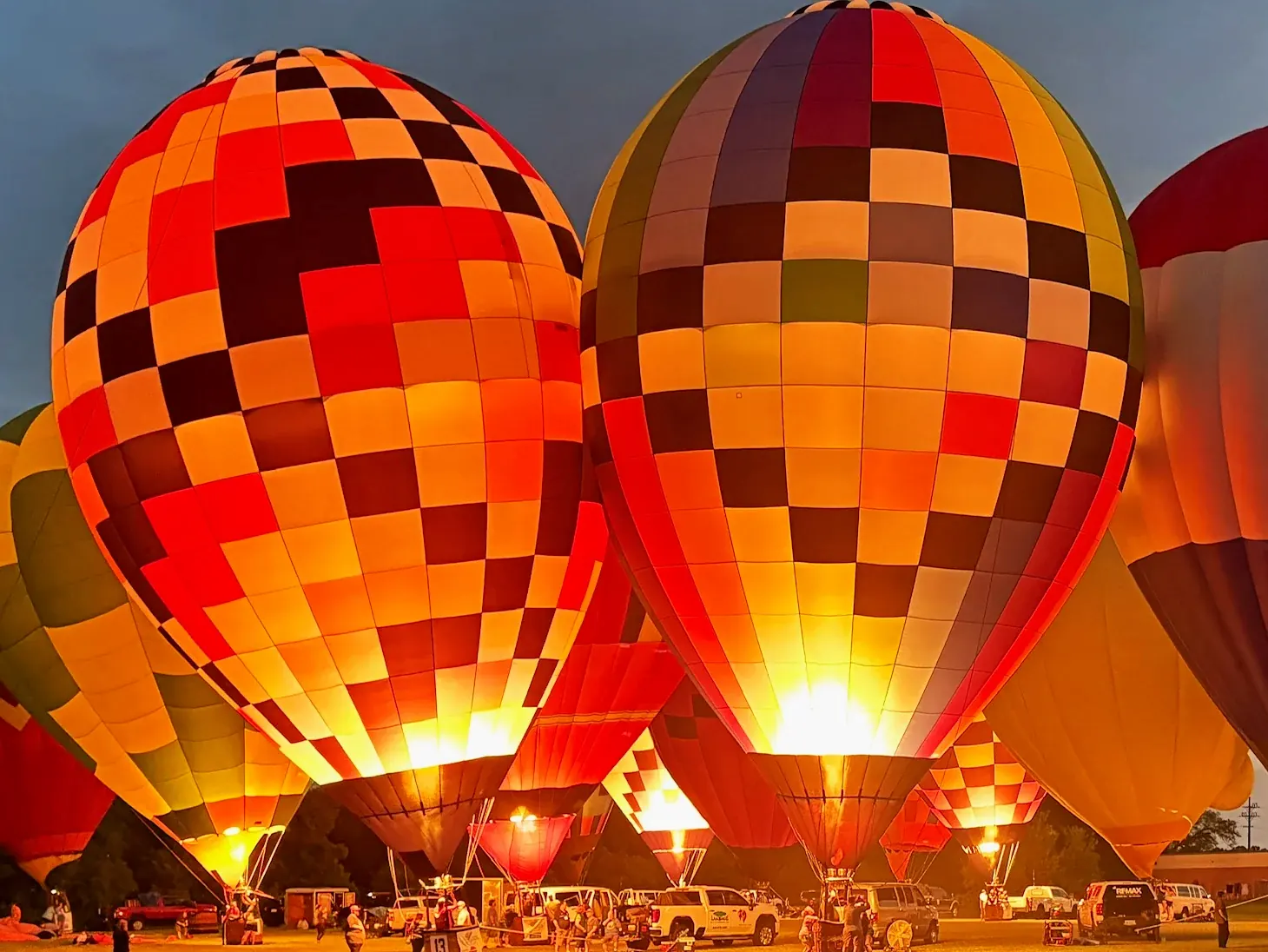 Balloons glowing at night at the Michigan Challenge Balloonfest in Howell